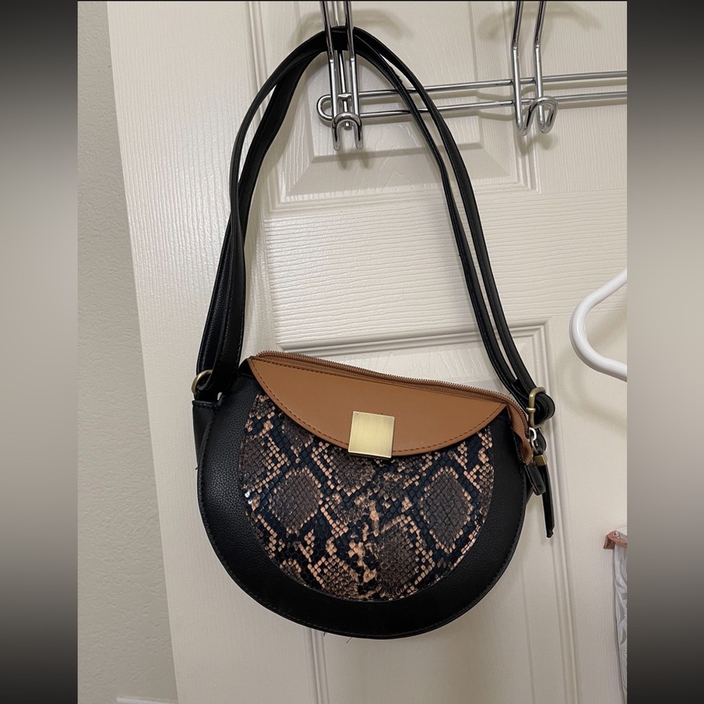 Black and brown shoulder bag. Like new. Only wore once